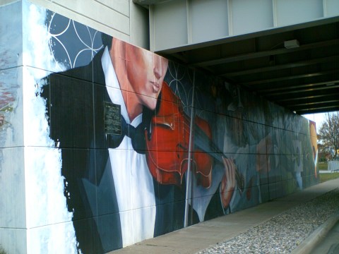 Violinist under the Poseyville Road overpass.